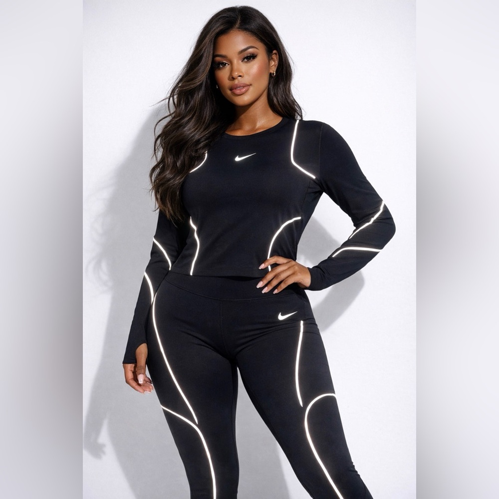 Nike Women's Black Long Sleeve Tee with Reflective Accents